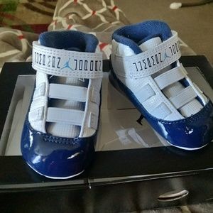 white and blue jordan 11 shoes